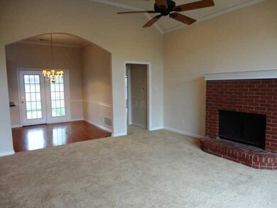 Great room opens to dining