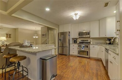 Beautifully updated kitchen has tons of space for 