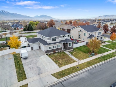 Aerial view of residential area featuring mountains