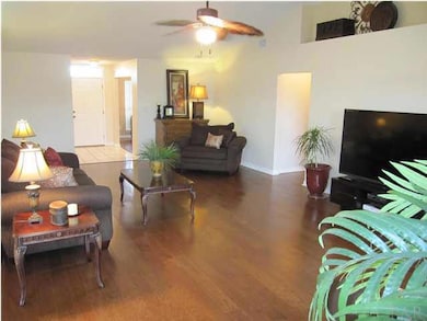 You will love the size of this room! A wopping 29' x 16' & room for the entire family to gather comfortably. View from the french door leading to the patio.