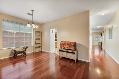 Diining room with a wall of windows and gorgeous h