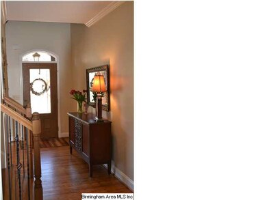 Formal Entry w/ Gleaming Hardwoods