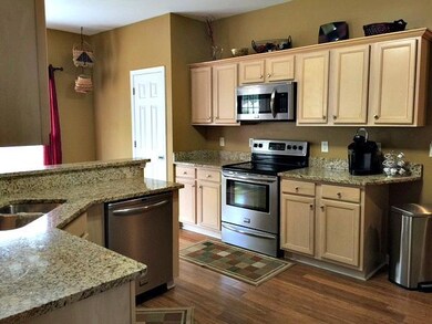 Lots of Cabinets and Granite Countertops in the Kitchen. Perfect for Family and Friends Gatherings.