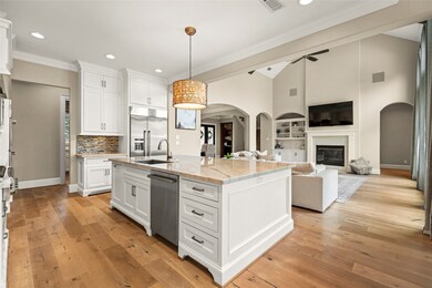 This spacious open-concept living area features a
