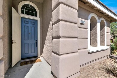 Doorway to property featuring stucco siding