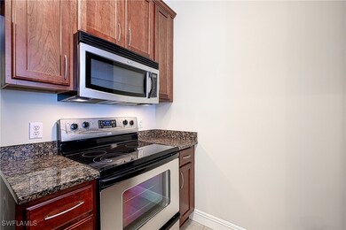 Kitchen with appliances with stainless steel finis