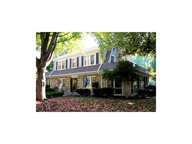 Large house with the garage behind