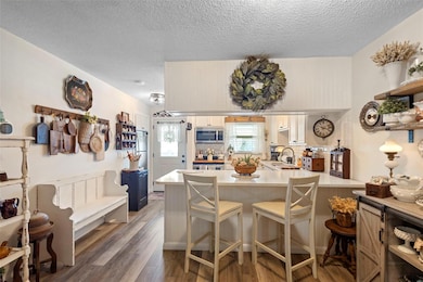 Kitchen and dining from living room view