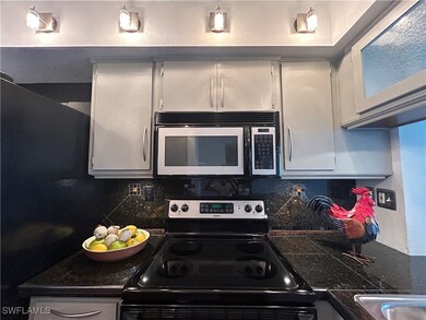 Kitchen featuring stainless steel appliances and d