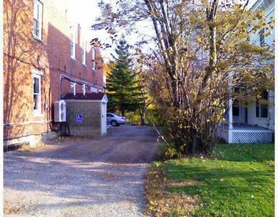 Exterior Front. Driveway to unit