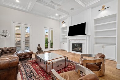The living room will lead you outside, to the back