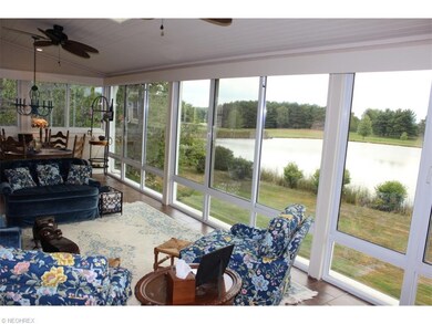 40 feet of  glass walls bring the water and golf c