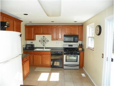 Kitchen. New stove, dishwasher, disposal, and refr