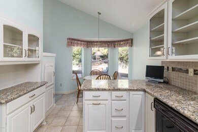 Kitchen opens to Breakfast Area