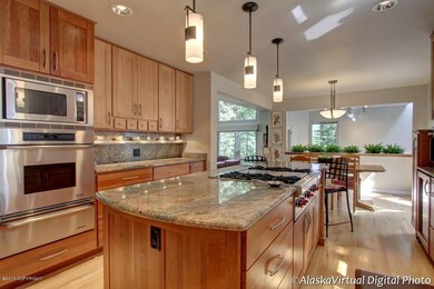 CUSTOM LIGHTING, SS APPLIANCES, WOOD FLR