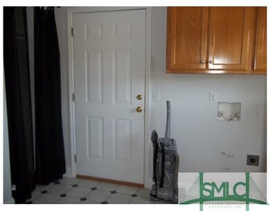 Other. Laundry room with storage closet and cabine
