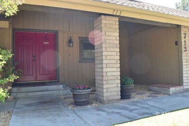 Front Double Doors and Covered Area