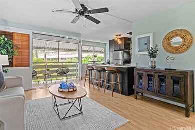 Open kitchen, living room, looking toward lanai. T