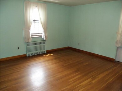 Master Bedroom with exposed hard wood floors