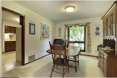 Formal dining room space.  Many new Marvin windows