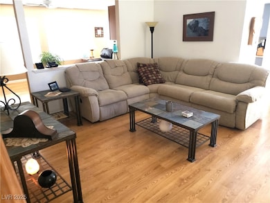 Living area featuring light wood finished floors