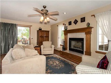 Gas fireplace, sliders lead to deck