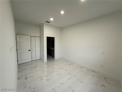 Unfurnished bedroom with recessed lighting, light
