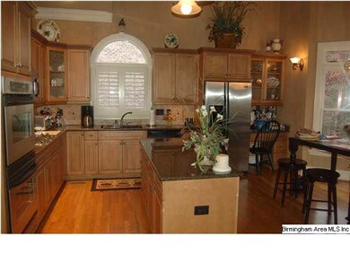 granite with island in kitchen
