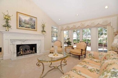 HUGE LIVING W/MARBLE FACE FIREPLACE