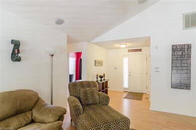 The front door entryway is roomy and inviting.