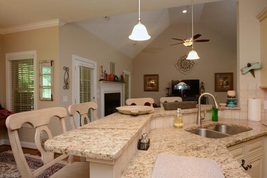 Plenty of counter seating in the spacious kitchen with wonderful cabinet space