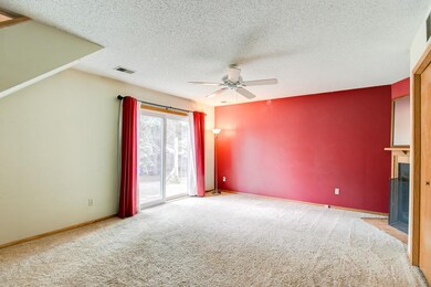 Lower level family room with sliding glass dor to 