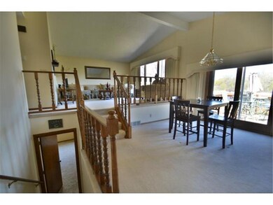 Vaulted main floor dining room, eat-in kitchen and