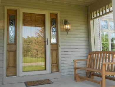 Come sit & stay awhile - covered front porch welco