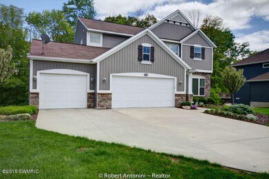 3614 Bridgehampton Dr NE Grand-small-002