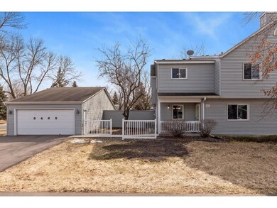 End unit townhome with private yard & 2 car garage