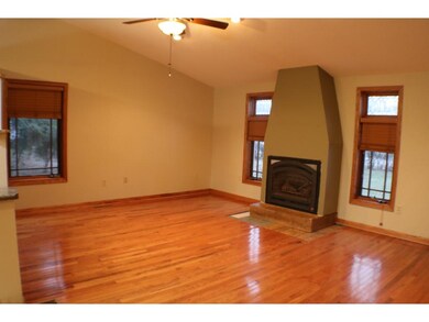 Family room with gas burning fireplace to cozy up 