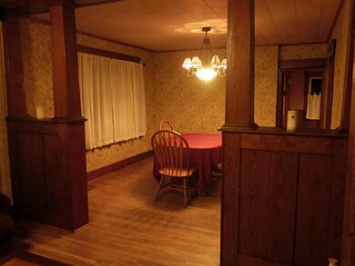 Dining Room. Beautiful hardwood floors extend into