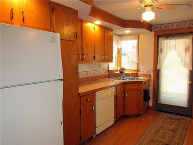 Kitchen with refrigerator,...