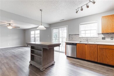 Kitchen with view of living room