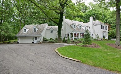 The spacious driveway offers ample parking space f