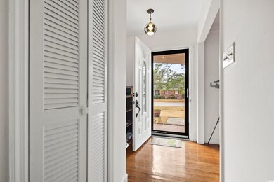 Entryway with wood-type flooring