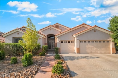 Mediterranean / spanish-style home featuring an at