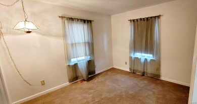 Main fl bedroom with new carpet and walk in closet