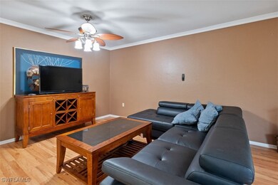 Living room featuring light wood-type flooring, or