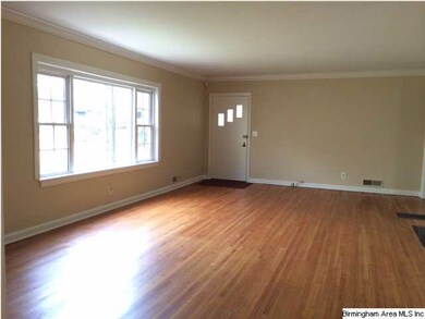 HUGE living room with large picture window and ton