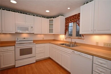 Kitchen with recessed lighting.