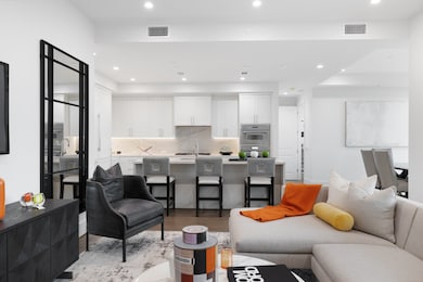 View of the kitchen from living room. (Sample of a