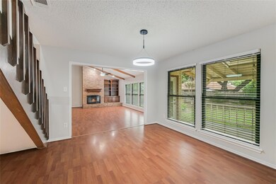 Unfurnished living room with wood finished floors