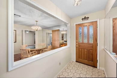 Welcome home to an inviting entryway with a seamless view into the elegant living areas.